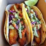 Crispy Baja Fish Tacos with Lime Crema and Cabbage Slaw
