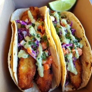 Crispy Baja Fish Tacos with Lime Crema and Cabbage Slaw