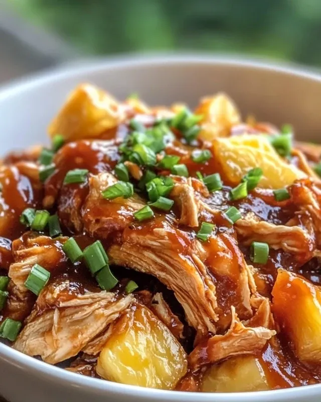Crockpot filled with Pineapple BBQ Chicken before cooking
