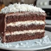 Sliced Mounds Cake showing layers of chocolate and coconut
