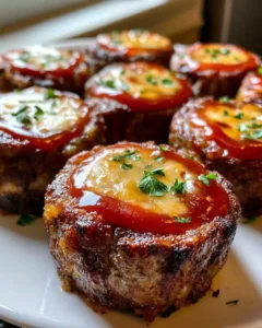 Cheesy Meatloaf Bites served with roasted vegetables and mashed potatoes