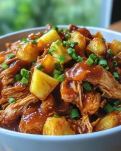 Pineapple BBQ Chicken sandwich on a bun with coleslaw