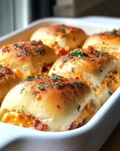 Platter of chicken bacon ranch sliders with side dishes