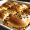 Platter of chicken bacon ranch sliders with side dishes