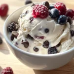 High protein ice cream sundae with berries and nuts