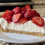 Whole strawberry cream cheese pie with decorative strawberry arrangement
