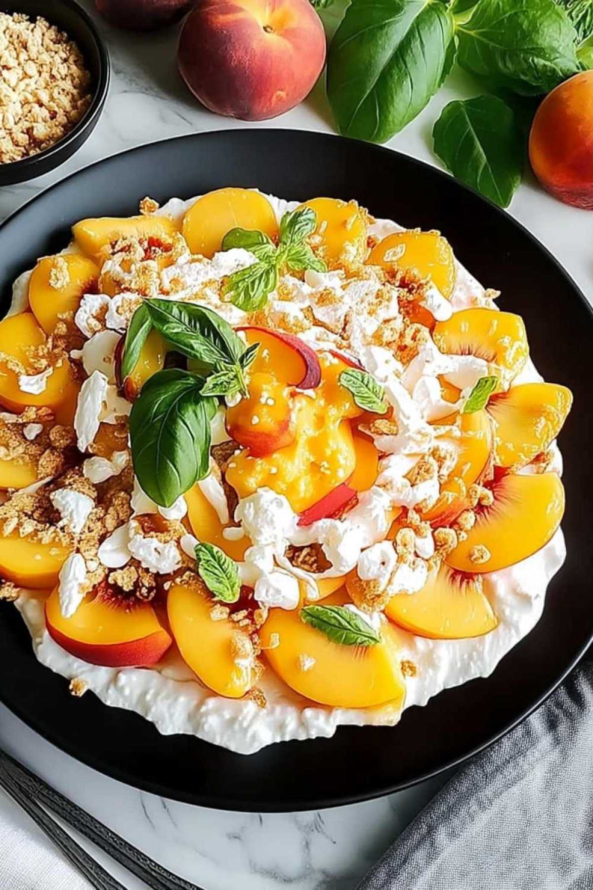 Creamy Millionaire Peach Salad served in glass bowl with pecans and coconut