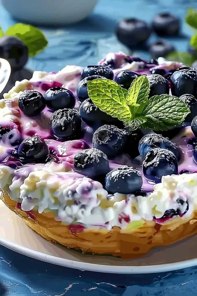 Golden blueberry cottage cheese breakfast bake in 8x8 baking dish fresh from oven