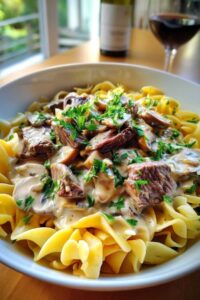 Beef strips browning in skillet for classic family-style beef stroganoff recipe