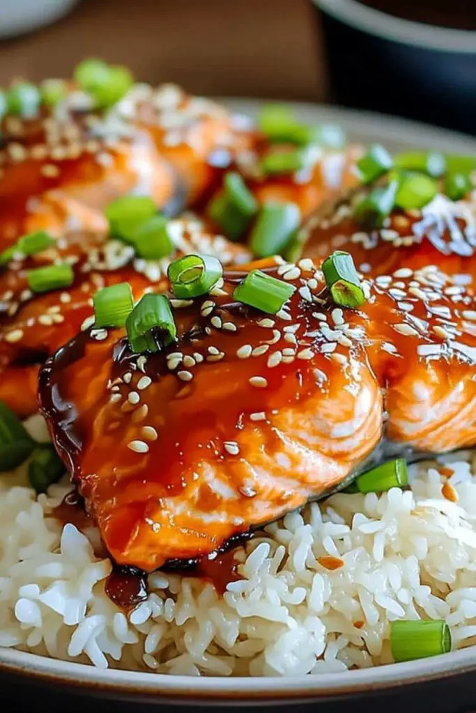Fresh salmon fillets marinating in ginger soy glaze mixture