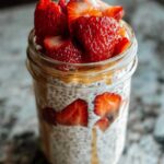 jar with overnight oats meal prep arranged for weekly breakfast
