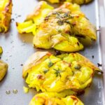 Smashed potatoes recipe ingredients including Yukon Gold potatoes and olive oil