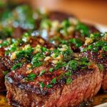 Finished Garlic Butter Brazilian Steak drizzled with herb butter sauce and garnished with parsley
