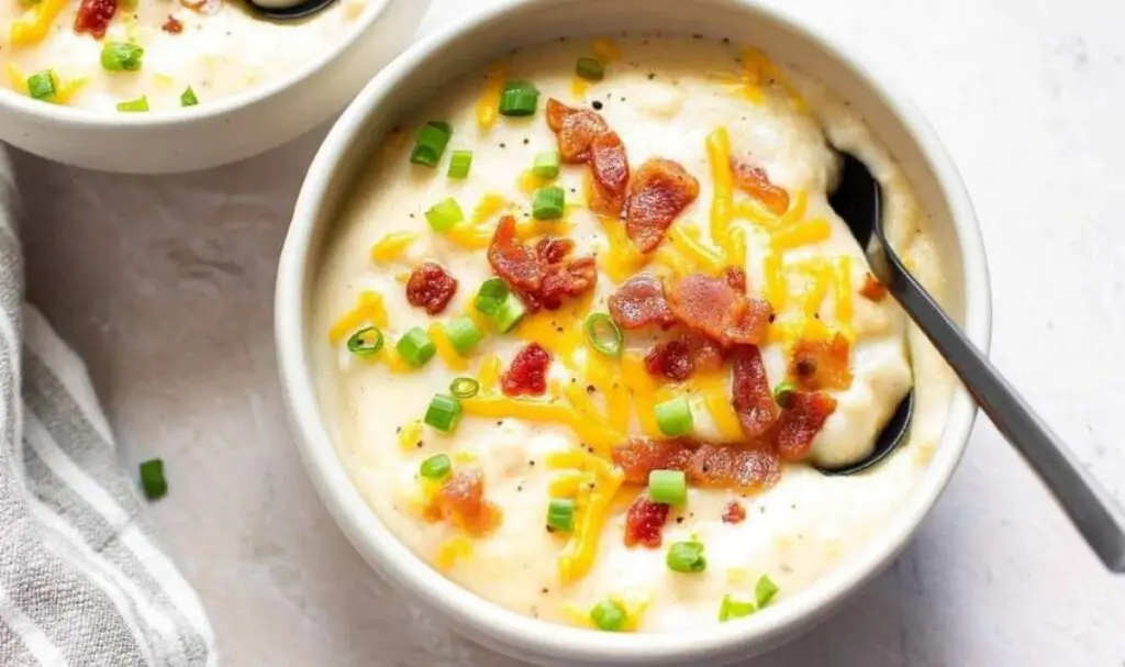 Cooking bacon and onions in pot for baked potato soup recipe