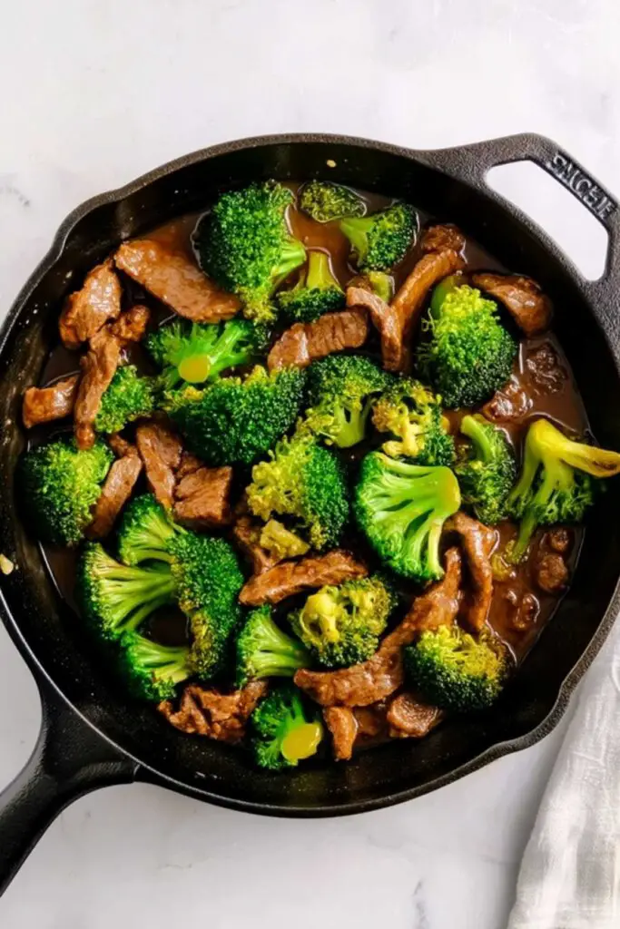 Fresh ingredients for easy beef and broccoli stir fry laid out on counter