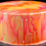 Easy mirror glaze recipe ingredients mixed in bowl showing smooth white chocolate base