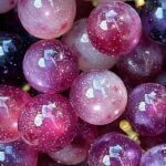 Close up of galaxy grapes showing candy coating texture and sparkles