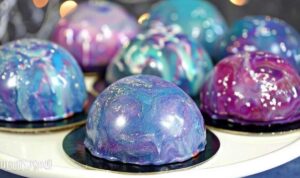 Galaxy Mousse Cakes ingredients including chocolate, cream, gelatin, and food coloring