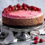 Ingredients for vegan chocolate raspberry mousse cake arranged on marble counter