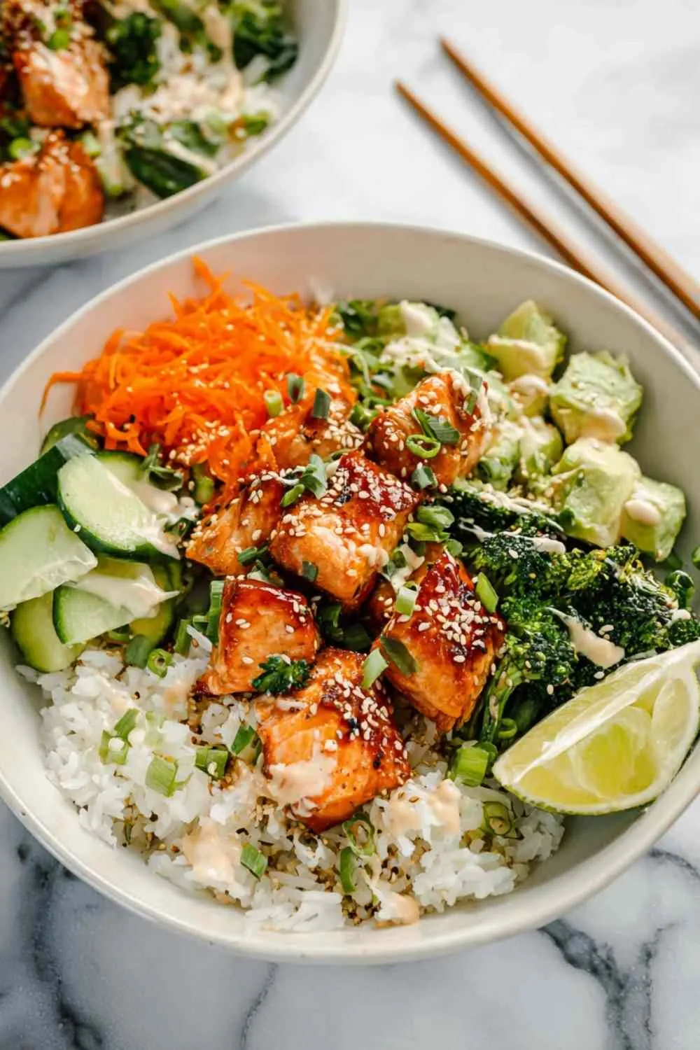 Complete crispy salmon bowl with fresh vegetables, rice and sesame seeds