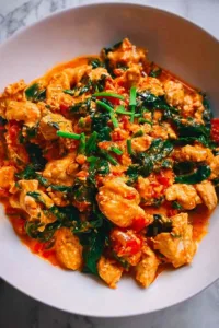 Ground turkey cottage cheese bowl with spinach in skillet ready to serve