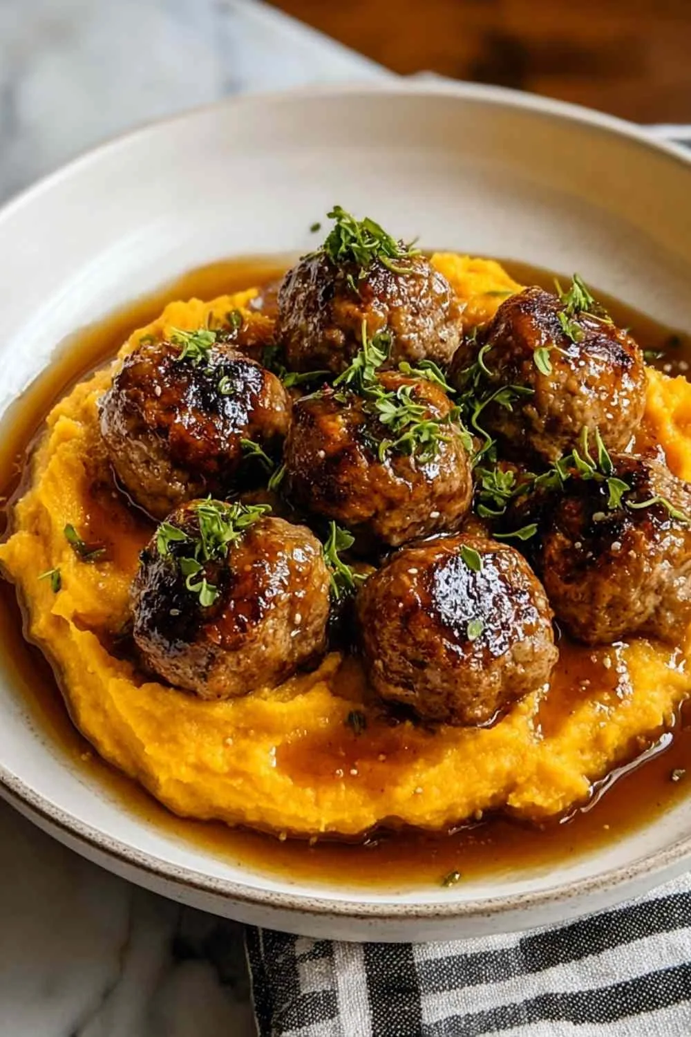 Pork Meatballs with Sweet Potato Mash Bourbon Maple Pan Sauce