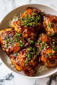 Slow Cooker Honey Garlic Chicken served over steamed jasmine rice