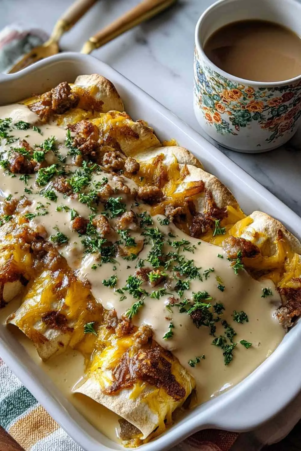 Southern Breakfast Enchiladas with Sausage Gravy in baking dish
