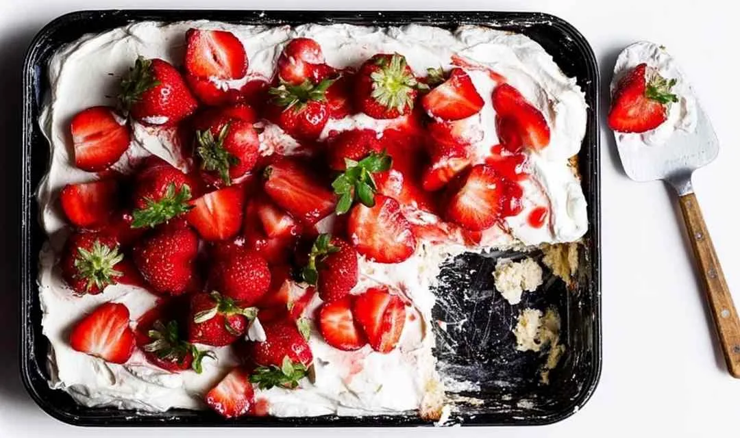 Tres Leches Cake with Whipped Cream and Strawberries