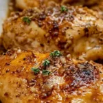 Brown sugar garlic chicken baked in a casserole dish with caramelized glaze
