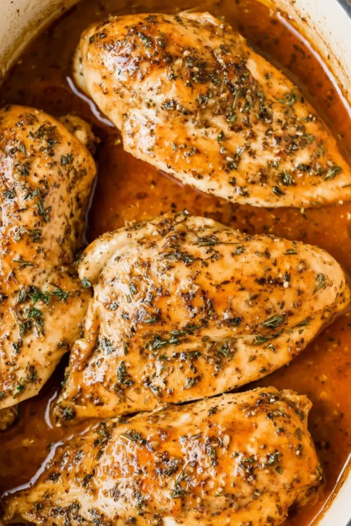 Brown Sugar Garlic Chicken baked in a dish with a sweet glossy glaze.