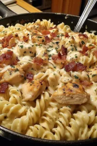 Creamy Chicken Bacon Ranch Pasta in a white bowl.
