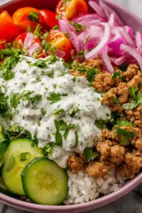ground turkey bowls with rice cucumber tomatoes and yogurt sauce
