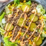High Protein Cheeseburger Bowl with beef and cheese in a white bowl