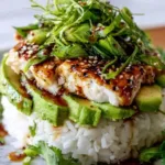 Honey Lime Chicken Avocado Rice Stack in a white bowl with grilled chicken slices and fresh avocado