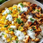 street corn chicken rice bowl with cotija cheese and fresh cilantro