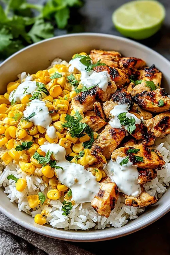 street corn chicken rice bowl with cotija cheese and fresh cilantro