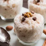 Ingredients for slow cooker coconut rice pudding including rice and coconut milk