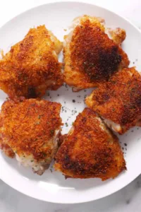 crazy crispy no oil chicken golden skin cooking in nonstick skillet