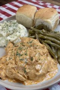 Crockpot Chicken and Gravy seasoned in a slow cooker