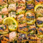 oven baked ribs seasoned with salt and pepper placed meatiest side down in a roasting pan ready to be covered with foil