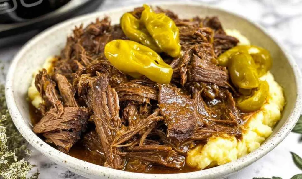 Mississippi Pot Roast served over mashed potatoes with rich savory gravy