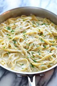 one pot garlic parmesan pasta in a skillet