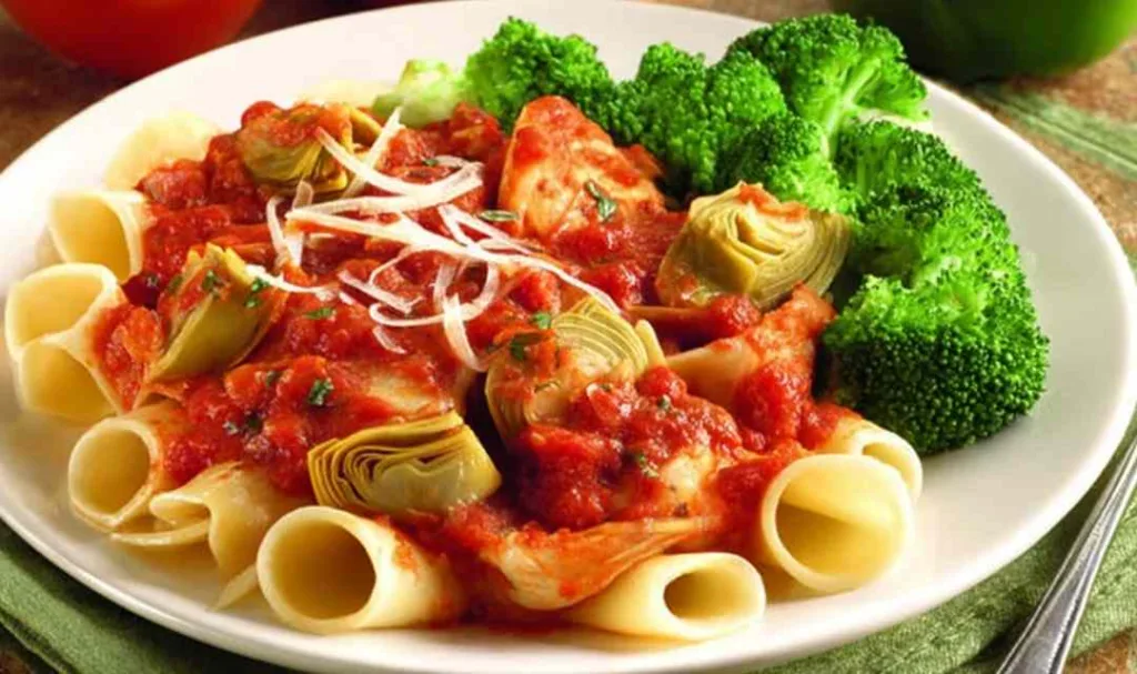 Artichoke pasta slow cooker recipe in a rustic bowl