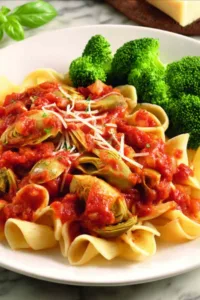 Artichoke pasta slow cooker recipe in a rustic bowl