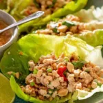 Thai lettuce wraps Larb Gai filled with spiced ground chicken, fresh mint, cilantro and crushed peanuts